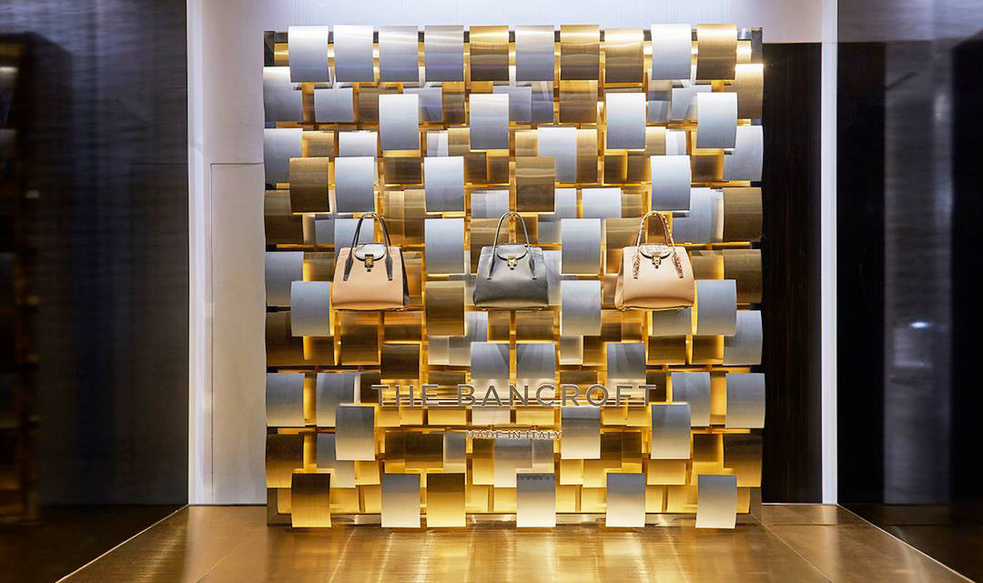 Gold aluminum display at Michael Kors
